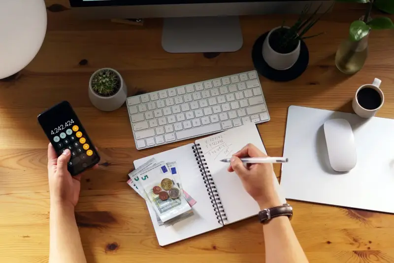 Entrepreneur reviewing personal finances and savings at home