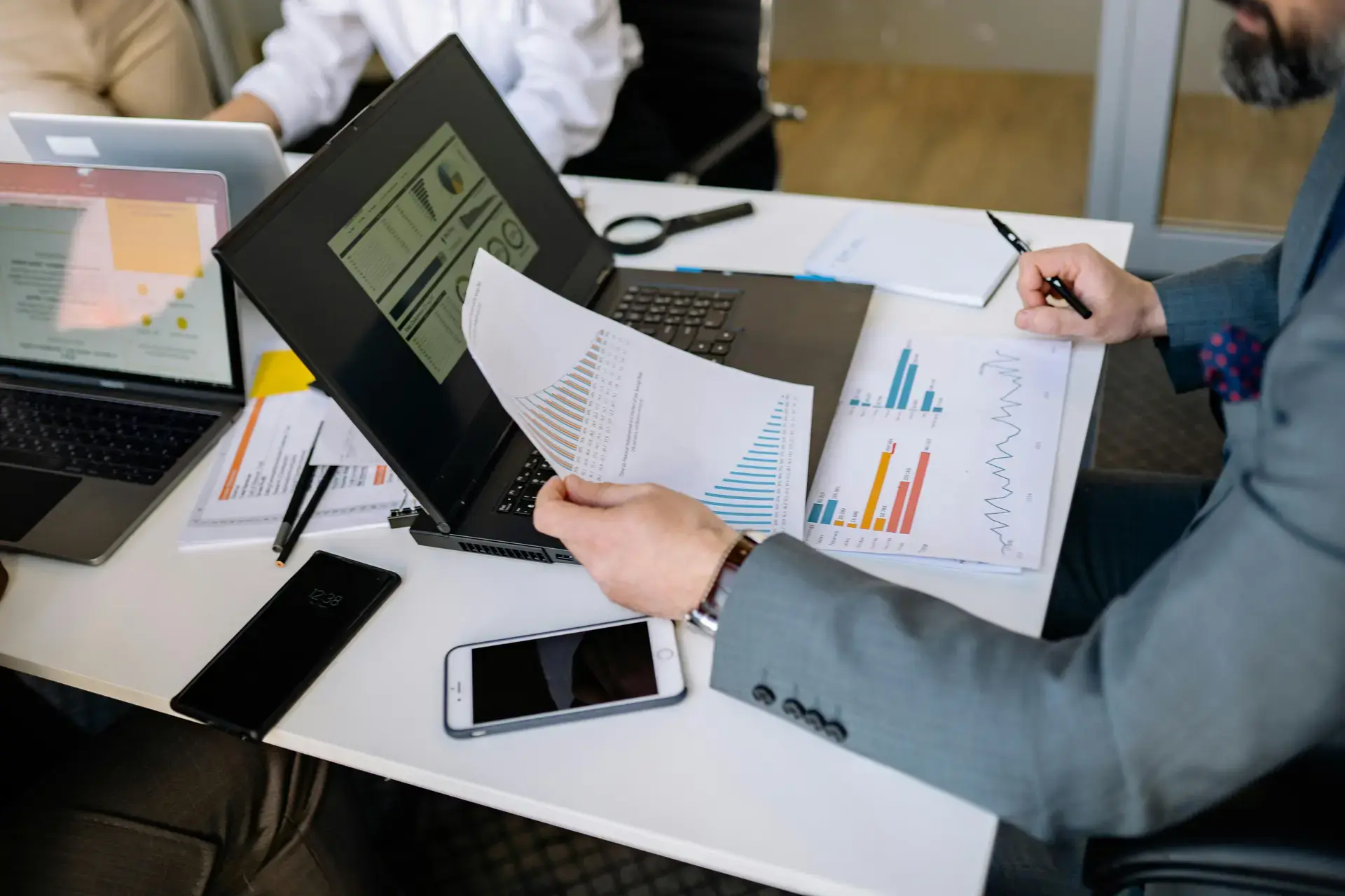 Business professional reviewing financial reports